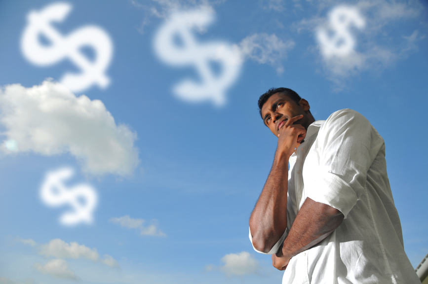 man looking at the clouds and thinking deeply
