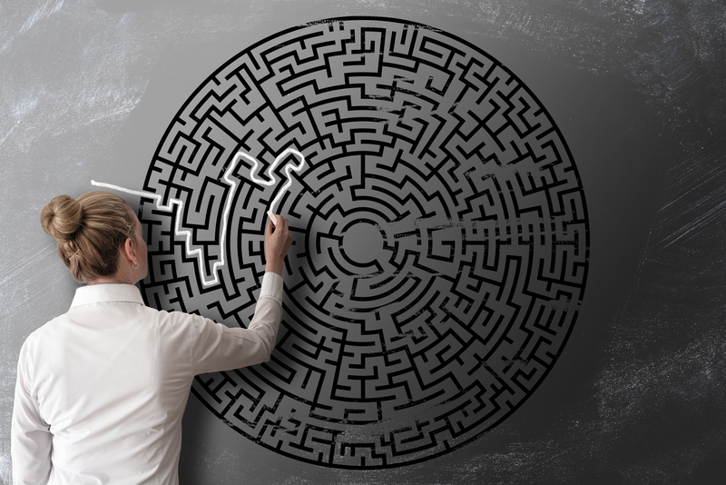 woman drawing in a maze